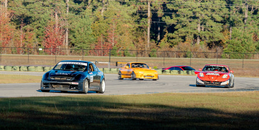 Anthony Guarnieri's Thunder Lane Infiniti G35 Time Attack car being chased by Ryan Lohrman in the Racing For Parkinson's Nissan 350z NISMO Time Attack car
